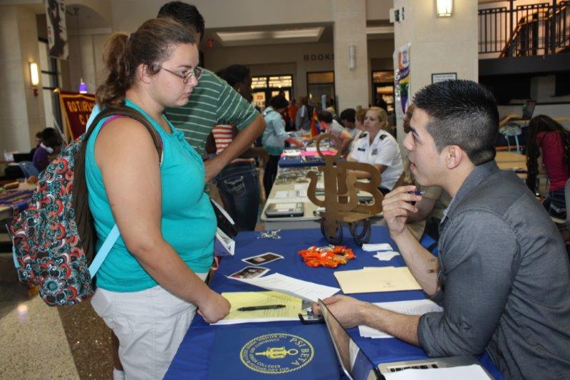 Students talking at Join a Club Day