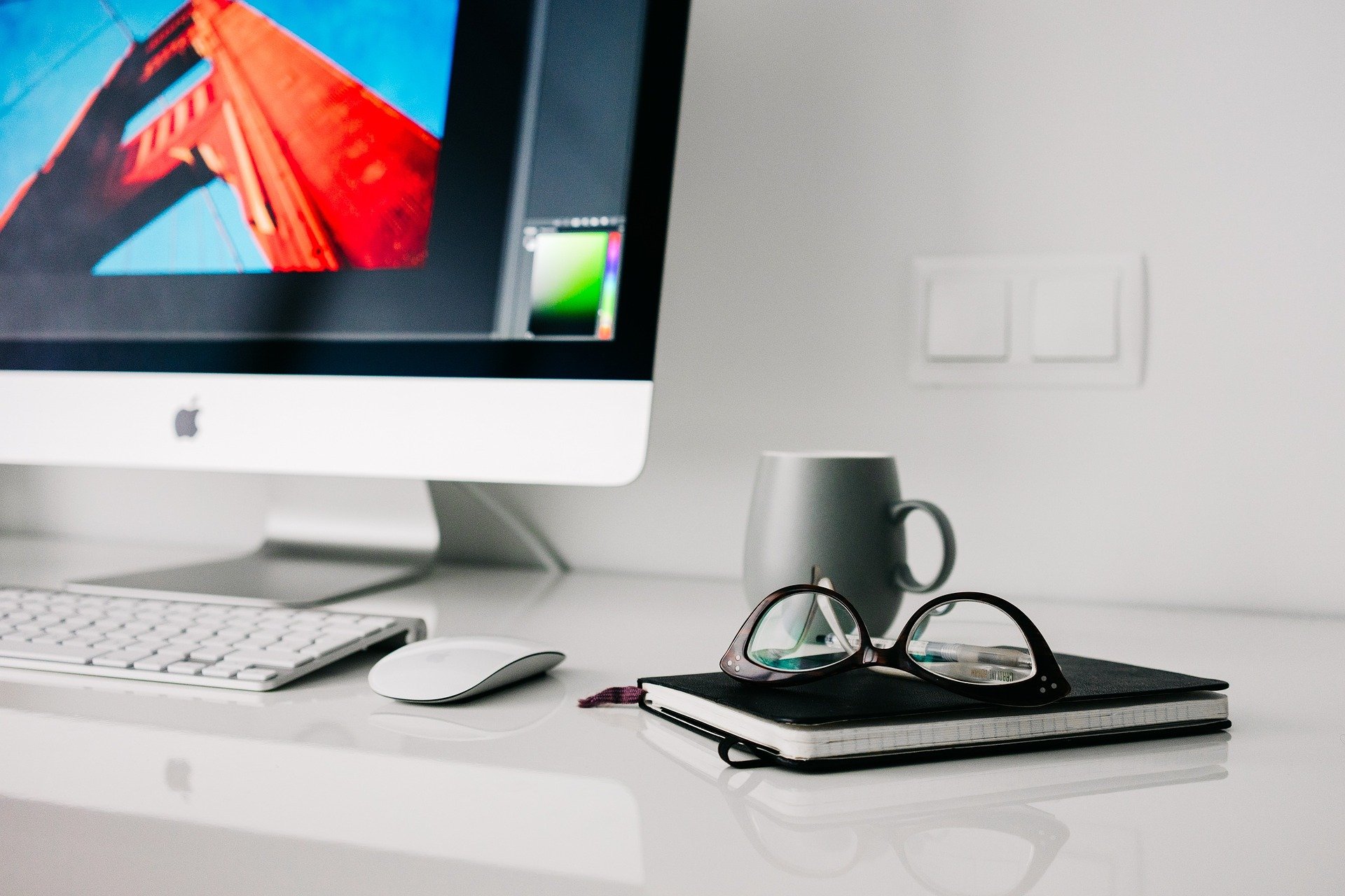 Picture of computer screen and desk